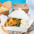 White Karat 54 fl oz Fold-To-Go Box open with rice and chicken
