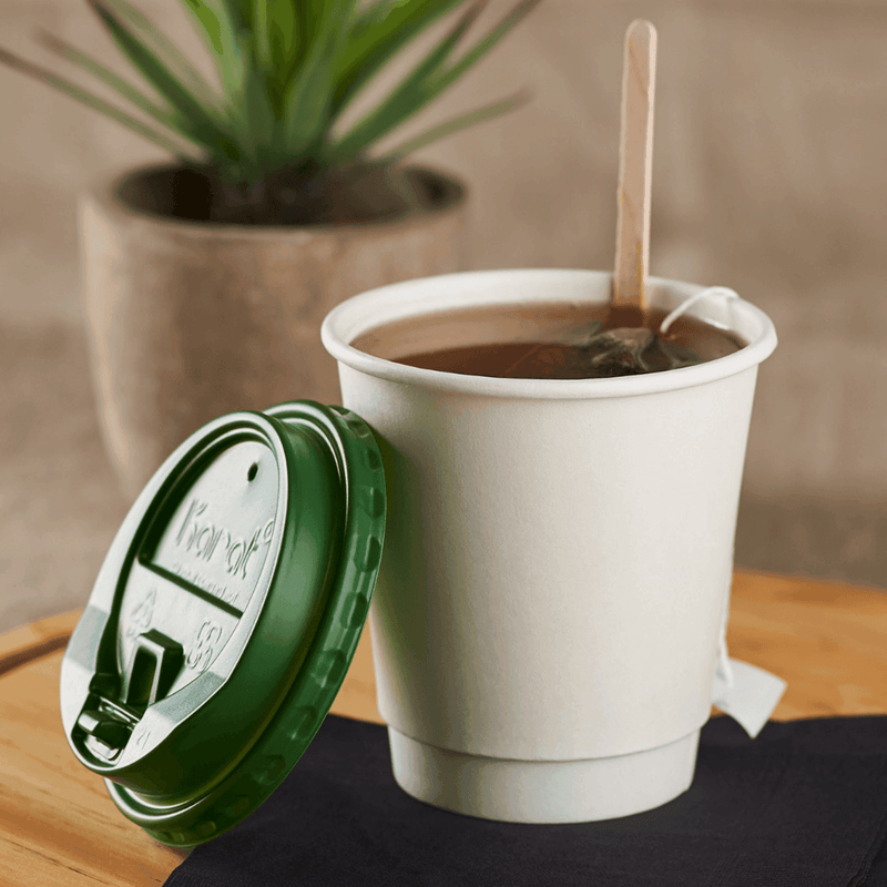 White Karat 10oz Insulated Paper Hot Cup with tea, stirrer, and green lid