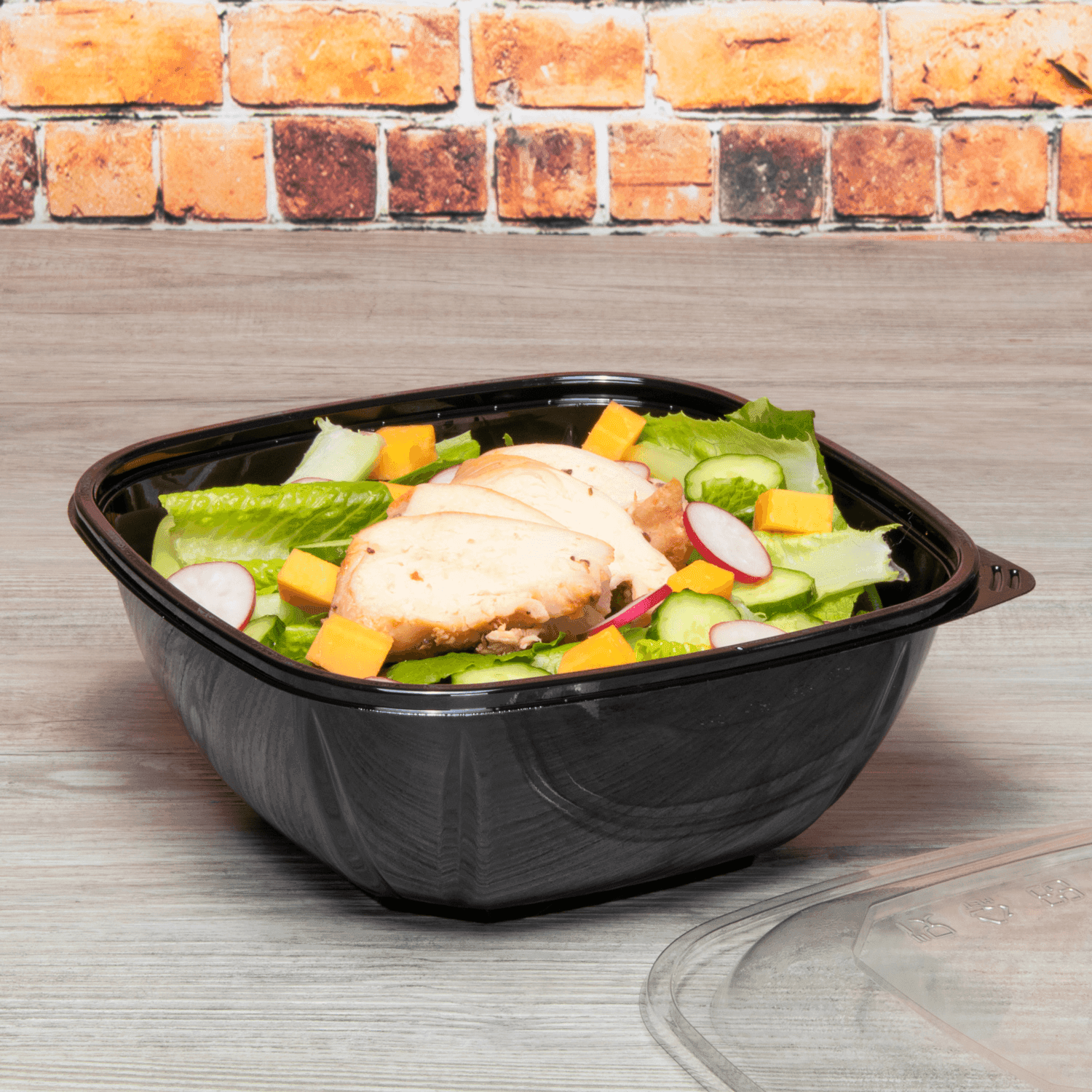 Black Karat 48oz PET Square Bowl with salad and grilled chicken