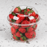 Karat PET Dome lid for 8-32oz with PET Round Deli Container filled with strawberries