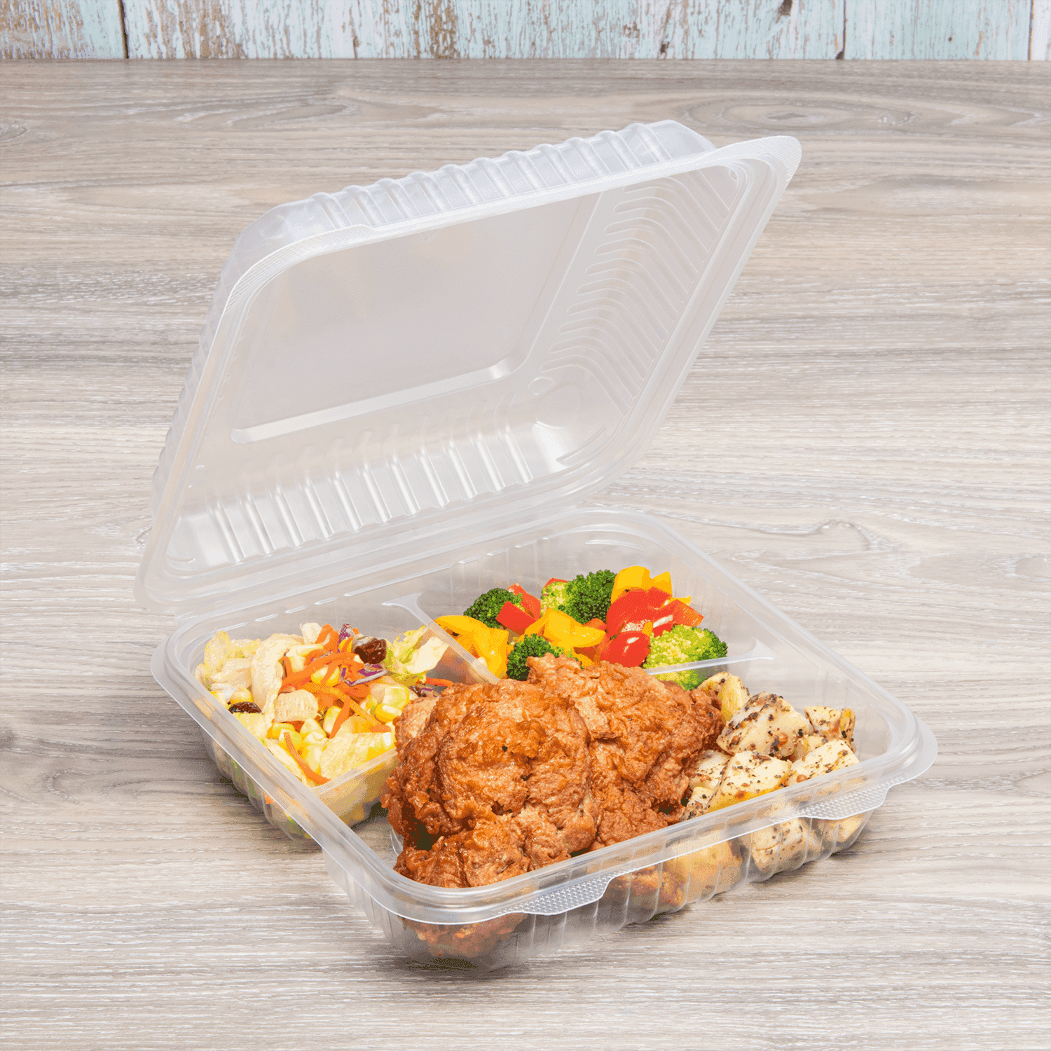 Karat 9" x 9" PP Plastic Hinged Containers with 3 Compartments open with food