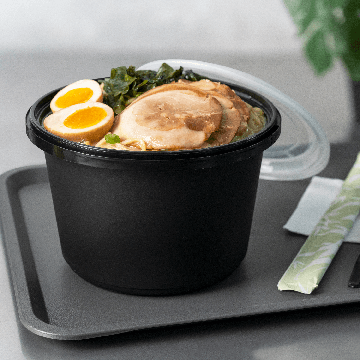 Karat 60oz PP Tamper Resistant Injection Molded Microwaveable Black Food Container w/Clear lid - 150 pcs