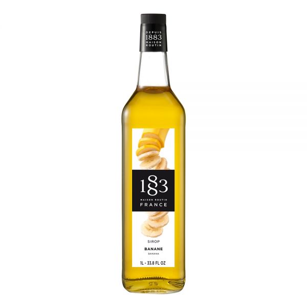 1883 Maison Routin Banana syrup in a clear 1 Liter bottle.
