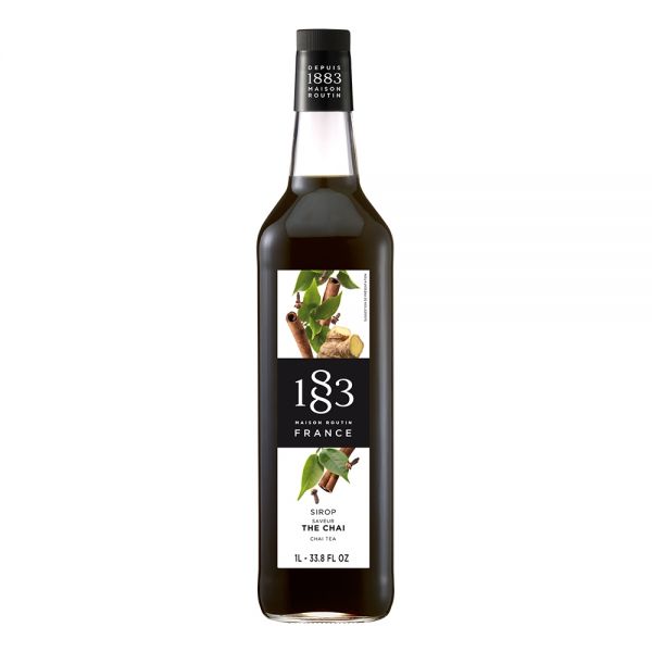 1883 Maison Routin Chai syrup in a clear 1 Liter bottle.