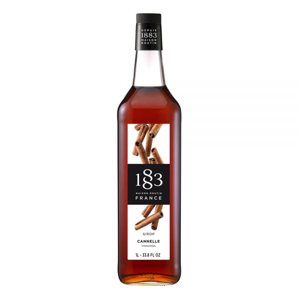 1883 Maison Routin Cinnamon syrup in a clear 1 Liter bottle.