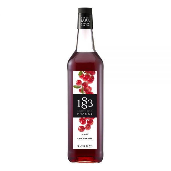 1883 Maison Routin Cranberry syrup in a clear 1 Liter bottle.