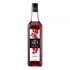 1883 Maison Routin Cranberry syrup in a clear 1 Liter bottle.