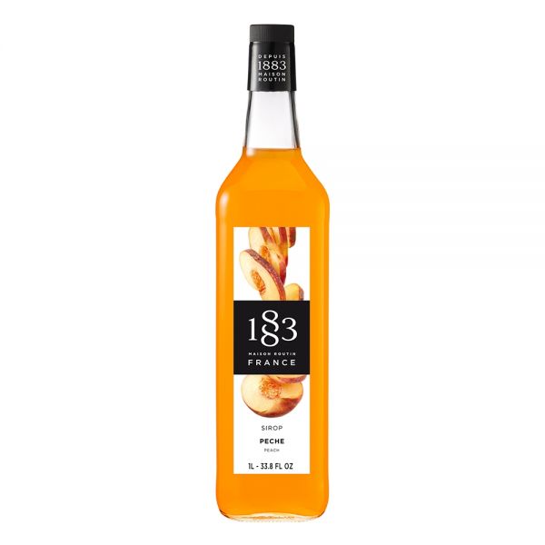 1883 Maison Routin Peach syrup in a clear 1 Liter bottle.