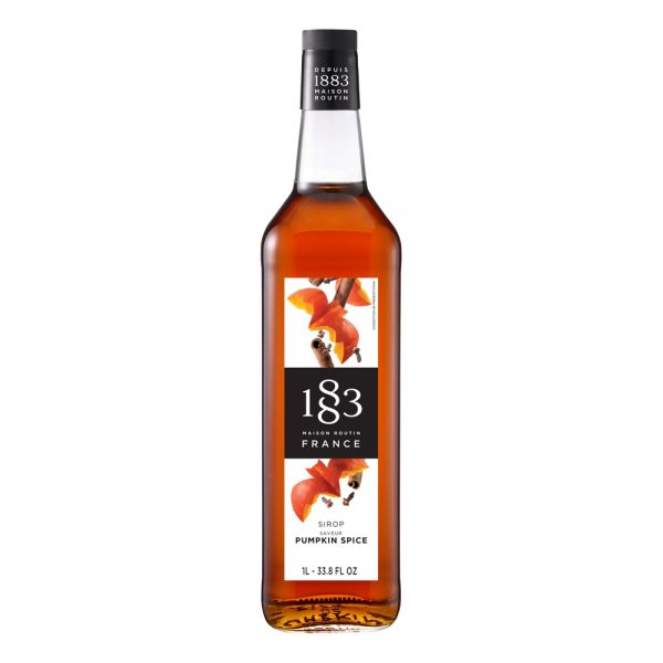1883 Maison Routin Pumpkin syrup in a clear 1 Liter bottle.