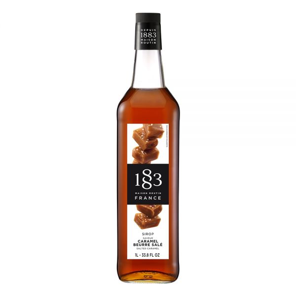 1883 Maison Routin Salted Caramel syrup in a clear 1 Liter bottle.