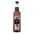 1883 Maison Routin Sugar Free Caramel syrup in a clear 1 Liter bottle.