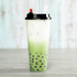 Matte Karat 24oz Tall Premium PP Plastic Cup with black lid and boba drink inside