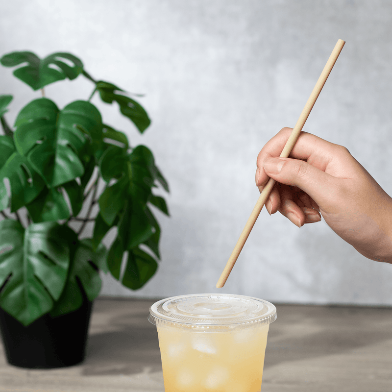 Karat Earth Diagonal Cut Bamboo Fiber Jumbo 9" Straw in  yellow drink
