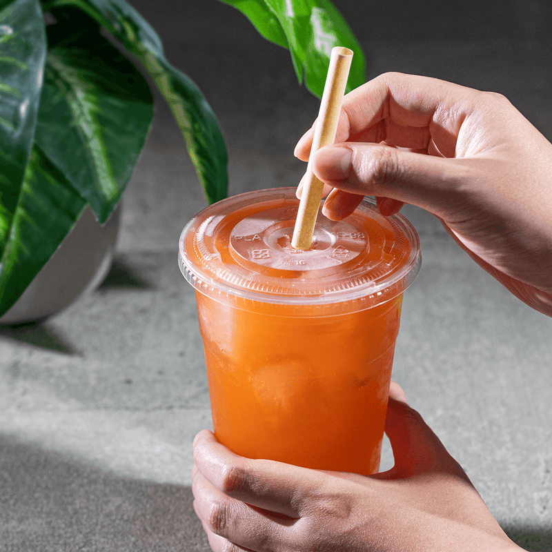 Karat Earth Flat Cut Bamboo Fiber Giant 9” Straw in orange drink