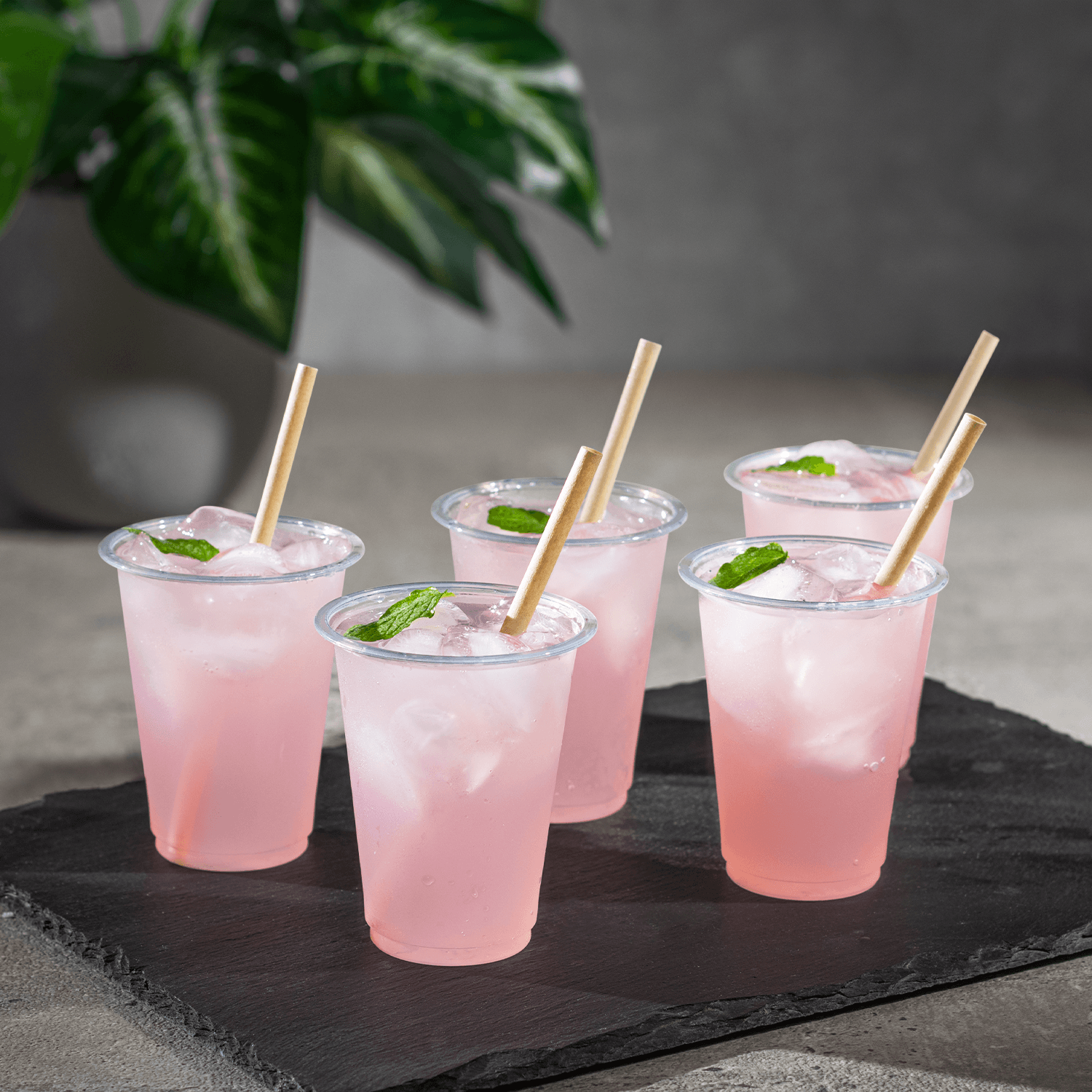 Karat Earth Bamboo Fiber Cocktail 5.5'' Straws in pink drinks