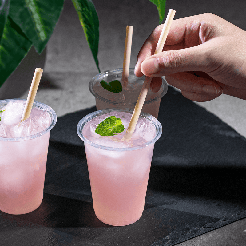 Karat Earth Bamboo Fiber Cocktail 5.5'' Straw in pink drink