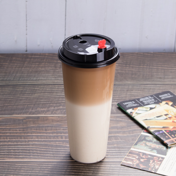 Black Karat 90mm Sipper Dome Lid for 16/24 oz Tall Premium PP Plastic Cup with matching cup and a latte