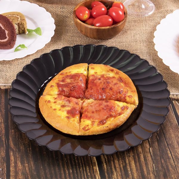 Black Karat 10.25" PS Plastic Scalloped Plate with pizza on top