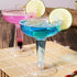 Karat 4oz PS Plastic Champagne Coupe with blue drink and lime
