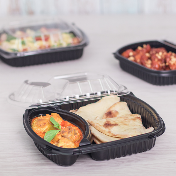 Karat 36 oz PP Plastic Microwaveable Black Take Out Box with 2 compartments with matching lid with naan and curry