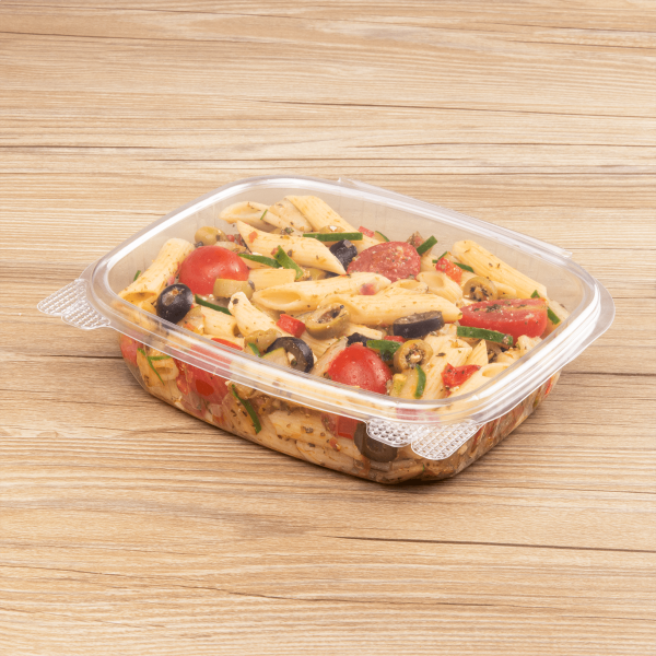 Clear Karat 24 oz PET Plastic Hinged Deli Container filled with pasta salad