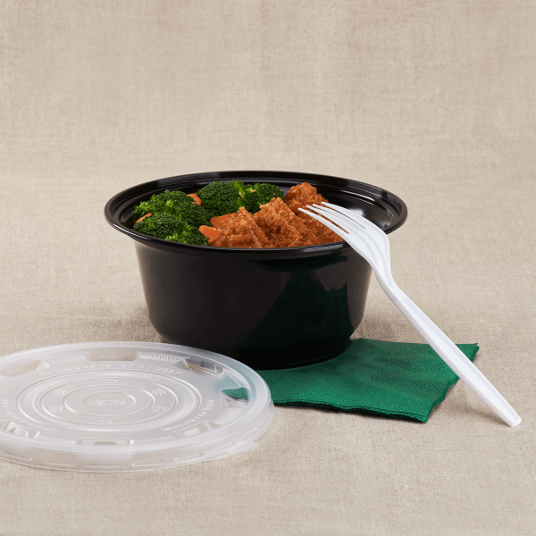 Black Karat 36oz PP Plastic Injection Molding Bowl with broccoli, chicken, carrots, matching lid, and a fork