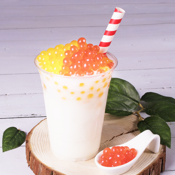 Tea Zone Coconut Powder made into drink with popping pearls on top