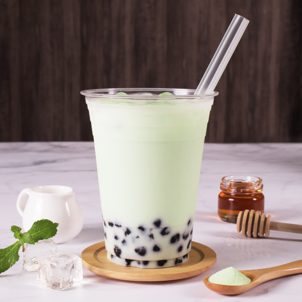 Tea Zone Honeydew Powder mixed into drink with boba
