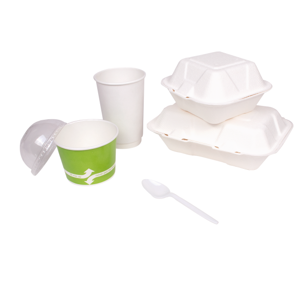 White Karat PS Plastic Medium Weight Tea Spoon next to containers