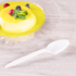 White Karat PS Plastic Medium Weight Tea Spoon being used with flan